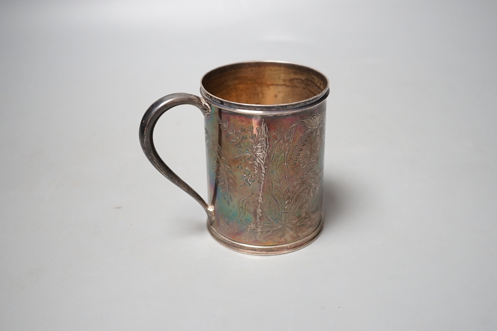 A Victorian engraved silver christening mug, Thomas Bradbury & Sons, London, 1874, 91mm.